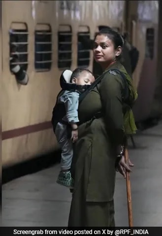 RPF Officer Patrols At Railway Station