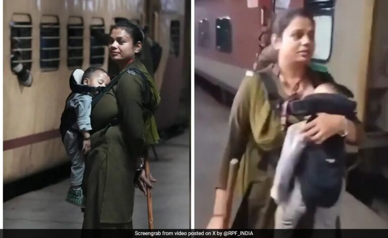 Video Of RPF Woman Constable Carrying Her Child And Performing Duties At New Delhi Railways Station Is Viral