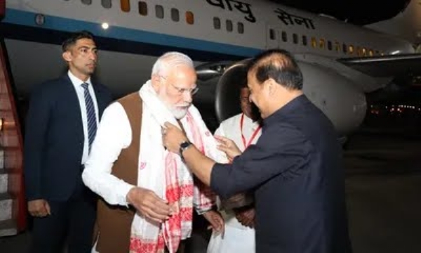 PM Modi arrives in Guwahati for ‘Jhumoir Binandini’